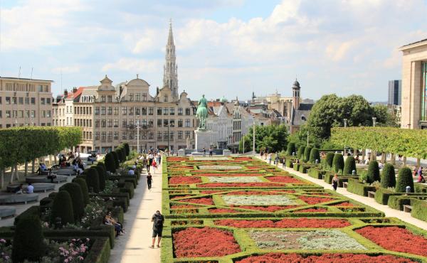 City scape of Brussels with a garden of flowers in foreground
