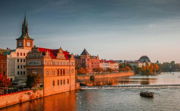 image of river and old buildings in prague
