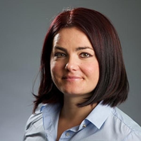 Smiling woman with brown hair